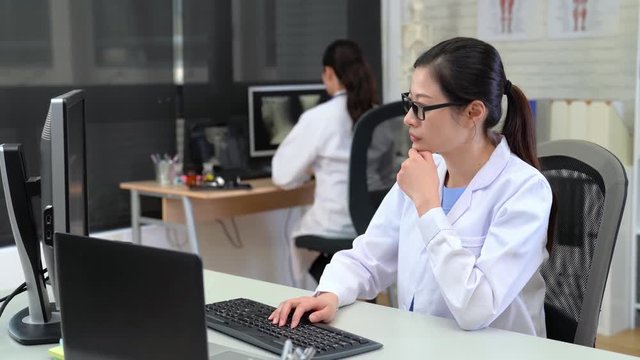 Woman Doctor using computer