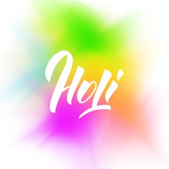 Holi. Colorful vibrant gulal powder explosion and Holi lettering. Holi festival of colors, spring, love