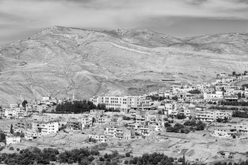 Fototapeta na wymiar Wadi Musa, small town near Petra, Jordan (monochrome)
