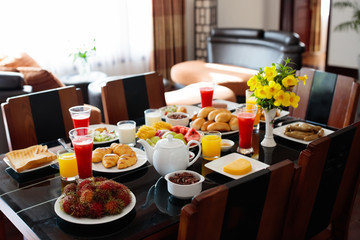 Healthy family breakfast. Fruit, bread, juice.