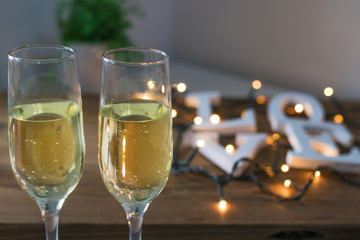 champagne glasses with love message of valentine's day