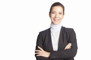 Executive mature businesswoman. A smiling middle aged woman wearing suit while standing with arms...