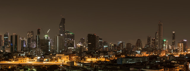 Building in Bangkok at night time.  Concept dark sky at city.
