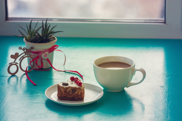 Valentine's Day, breakfast for your favorite - cup of coffee, with a heart shaped cake
