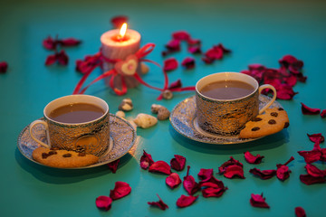 Valentine's Day, romantic dinner - two vintage cups of coffee and cookies