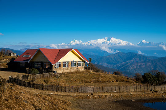 landscape of Tonglu trekkers hut and Kangchenjunga mount during blue sky day time