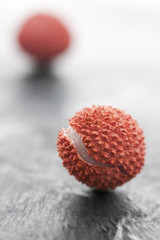 broken lychee on slate