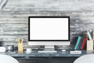 Modern desk top with blank white computer