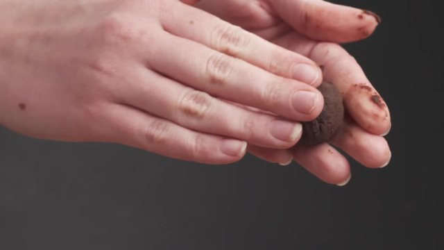Slow motion closeup making truffle candy