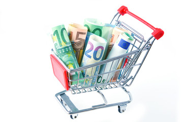 Euro banknotes rolled in supermarket Cart  with white background