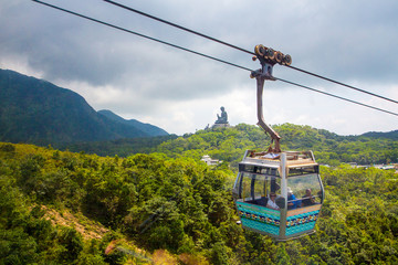 Hong Kong, August 30, 2017. Ngong Ping 360 is a tourism project on Lantau Island in Hong Kong with Buddha on the horizon. The project was previously known as Tung Chung Cable Car Project