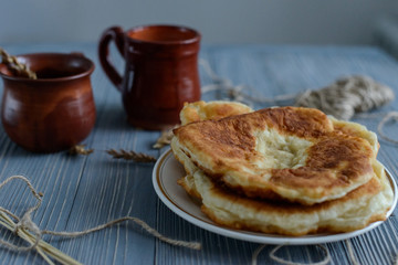 Homemade fried patties on wooden table