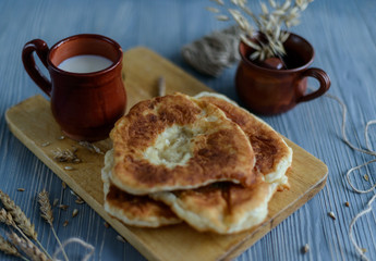 Homemade fried patties on wooden table