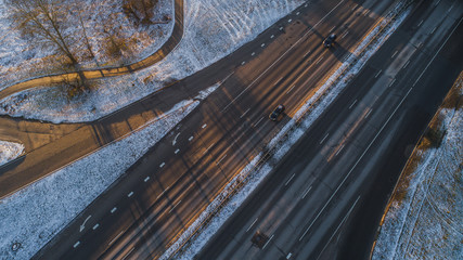 Riga elevated road junction and interchange overpass at winter sunset time