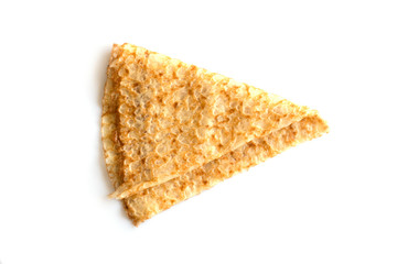Close up on a folded crepe (french pancake) isolated on white background