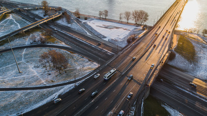 Riga elevated road junction and interchange overpass at winter sunset time