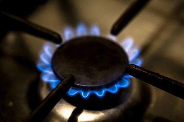 blue fire by natural gas on the owen for cooking