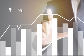 businessman hand working with modern technology and digital layer effect as business strategy concept