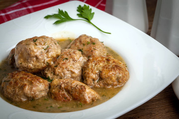 Pork meatballs with dill sauce.