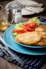Crispy fried homemade potato pancakes.