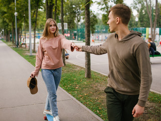 skateboarding teaching lessons. Active lifestyle. Teenage relationships leisure and hobby. Trust concept