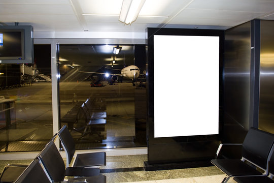 Airport Terminal Lounge Blank Billboard Stand And Airplane On Background