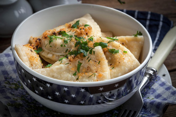 Dumplings with meat, onion and bacon.