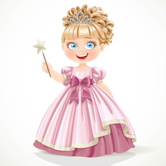 Cute little princess in pink dress and tiara holding magic wand isolated on white background
