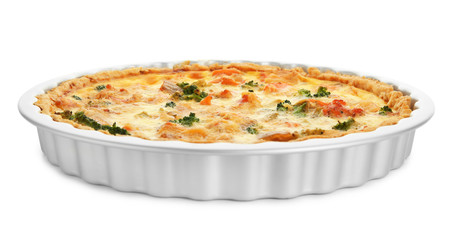 Baking dish with tasty broccoli quiche on white background
