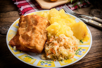 Fried cod fillet served.