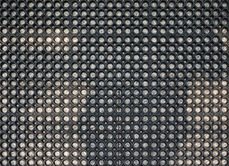 Closeup of the black rubber doormat.