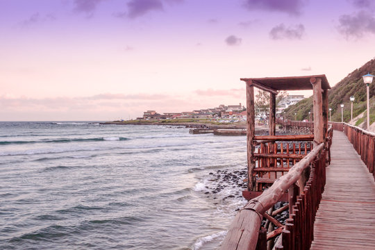 Gonubie beach boardwalk at sunset. Beautiful seascape background