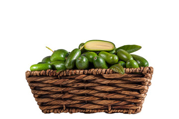Fresh seedless cocktail avocado in the basket isolated on white background. Cucumber avocado. Marks and Spencer new genetic gift for avocado fans.