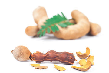 Fototapeta premium tamarind - Sweet ripe tamarind with isolated on a white background. soft focus 