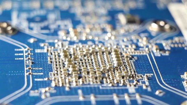 Computer circuit board close up, electronic technology background.
Electronic components on a computer board.
