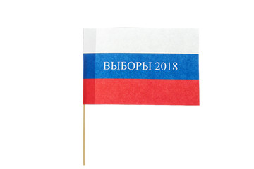 The word election in a small paper flag of Russia