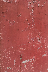 Concrete vintage wall background, old wall, close up / Red color and colored / Part of architectural background, rustic materials and texture detail.