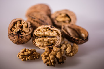 walnuts kernel broken shells on white background 