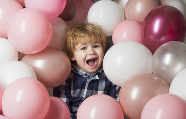 Fototapeta na wymiar Child screams in balloons. Cute crying at party. Beautiful background with pink balls and sad kid. Children hysteria or laughing, smile baby open mouth. Happy childhood. Birthday gifts and discounts