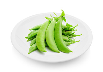 green peas in a plate on white background