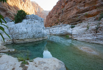Beautiful Eastern landscape. Wadi Bani Khalid. Wadi Shab. Oman.