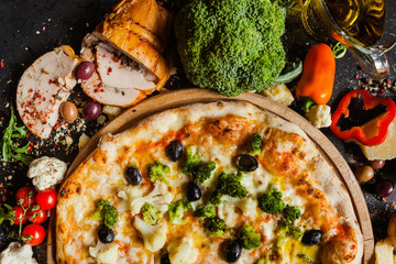 Vegan cauliflower broccoli pizza. Diet dish with lots of vegetable proteins for healthy nutrition...