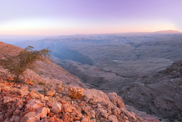 Fototapeta na wymiar The beautiful rocky landscape of the Arabian desert. The Hajar Mountains, Wadi Fins. Gulf of Oman.