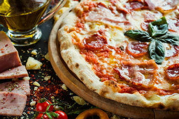 Pepperoni pizza. Classical recipe of Itallian pizzerias