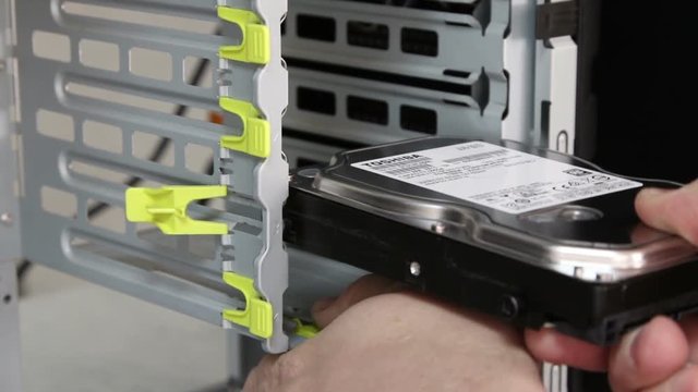 Installing hard drive at computer case