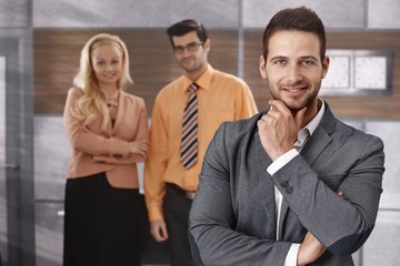 Portrait of handsome smiling businessman