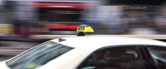 german taxi cab speeding in the city