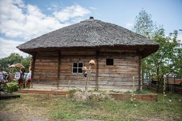 Fototapeta na wymiar Sorochinsky Fair. Mirgorod. Old wooden Ukrainian house.