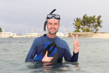 Diver giving a peace sign after an immersion