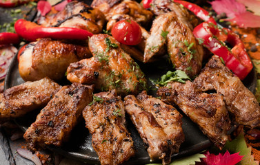 meat dishes overeating gluttons delicious concept. nourishing and fatty unhealthy eating. food photography.